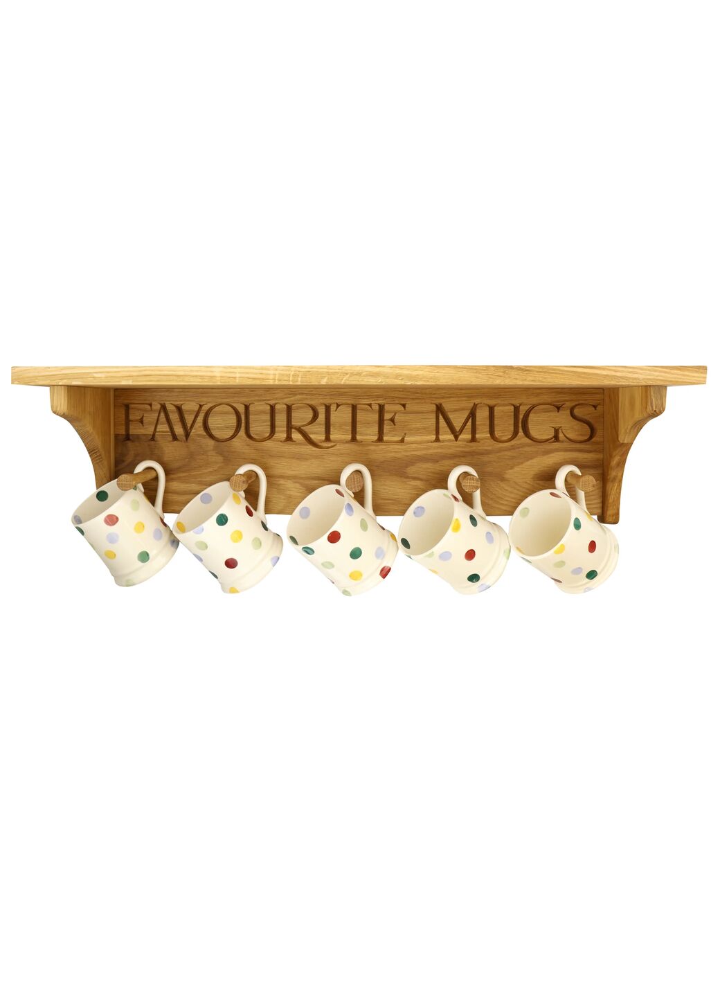 Oak mug rack engraved with 'Favourite Mugs' holding polka dot mugs, perfect for adding charm to kitchen decor.