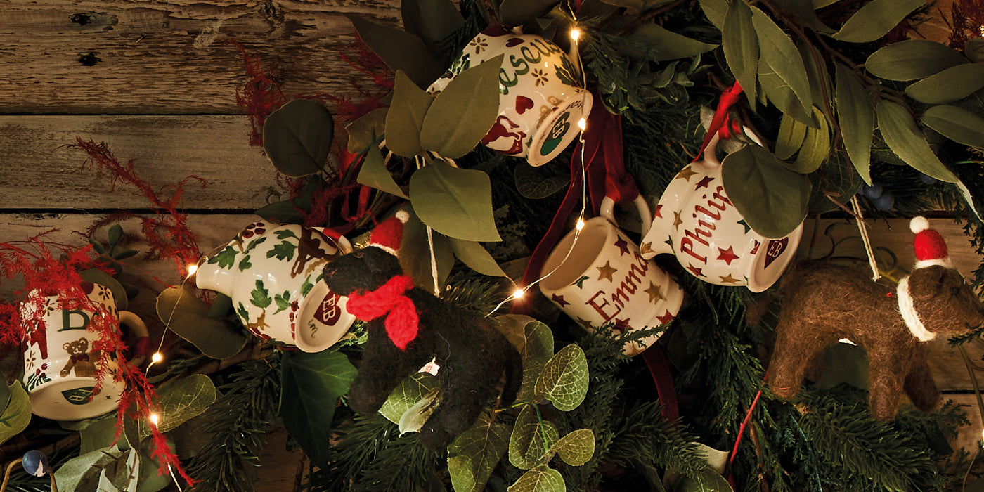 Mini mugs & jugs Christmas decorations to put on your Christmas tree. Personalised baubles with a festive pattern for home decoration. Part of Emma Bridgewater personalised Christmas decoration collection.