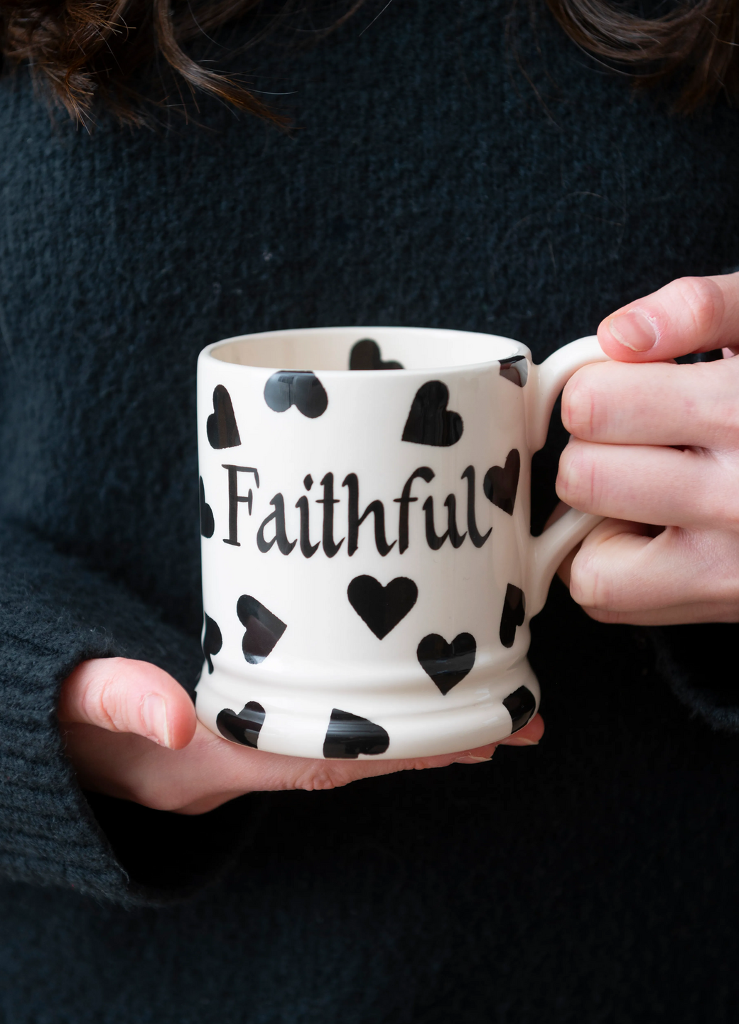 Hand-painting pink heart mug with 'Love you' text, showcasing personalised ceramic art and gift craftsmanship.