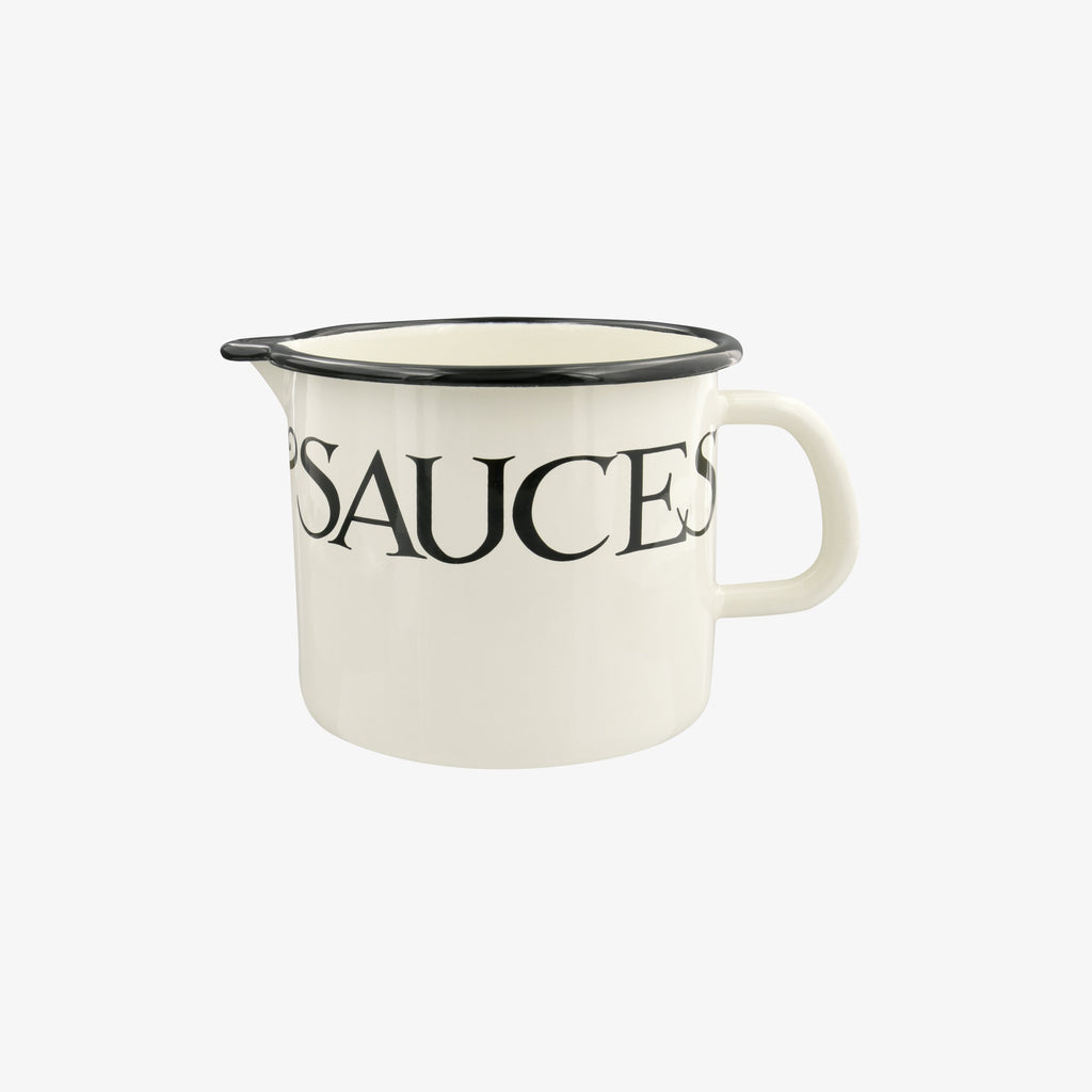 Emma Bridgwater Black Toast Large Enamel Jug - featuring a classical white finish with black printed letterings printed on the jug reading 'sauces'.