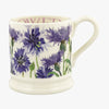 1/2 pint ceramic flower mug with a pretty purple cornflower hand printed design. English-made ceramic cream pottery mug featuring the words flower inside the half pint mug. The ideal present for mums and sisters for birthdays or celebrations.