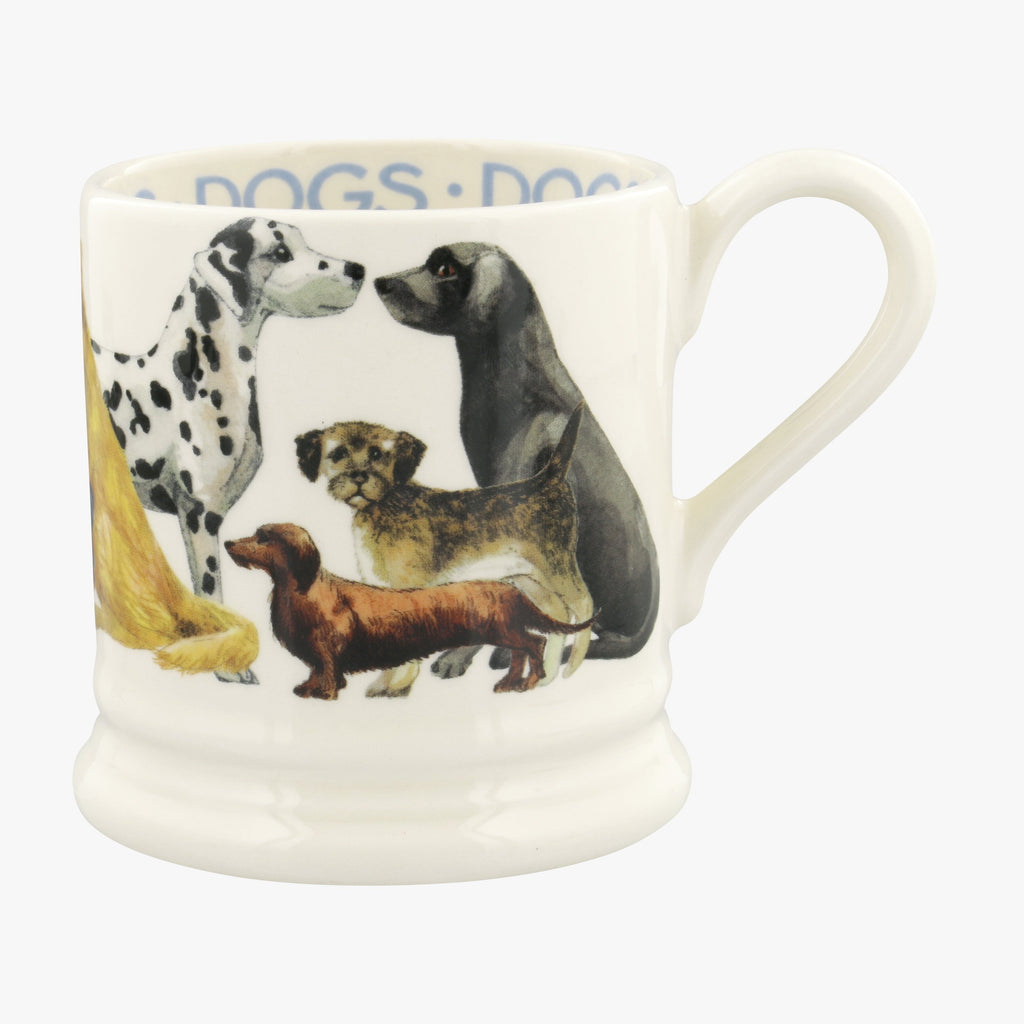 Emma Bridgwater ceramic Dogs All Over 1/2 Pint Coffee or Tea mug - made with English earthenware and featuring adorable dogs from Dalmatians, Labradors, Sausage dogs and more printed around the mug. 