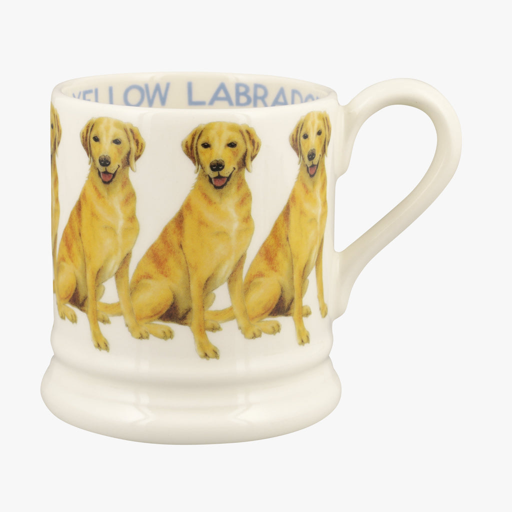 Emma Bridgewater ceramic Yellow Labrador 1/2 Pint Coffee or Tea Mug - Brighten up your day with these adorable yellow Labradors on a mug. Made from English earthenware and featuring a classic cream mug with a dash of yellow. Find the text 'Yellow Labrador' on the inside for a unique touch.