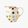 Emma Bridgewater ceramic 1/2 Pint Jug - made from earthernware featuring a colourful hand painted polka dotted pattern on a beige base that will surely bring joy to your kitchen and dining tables. 